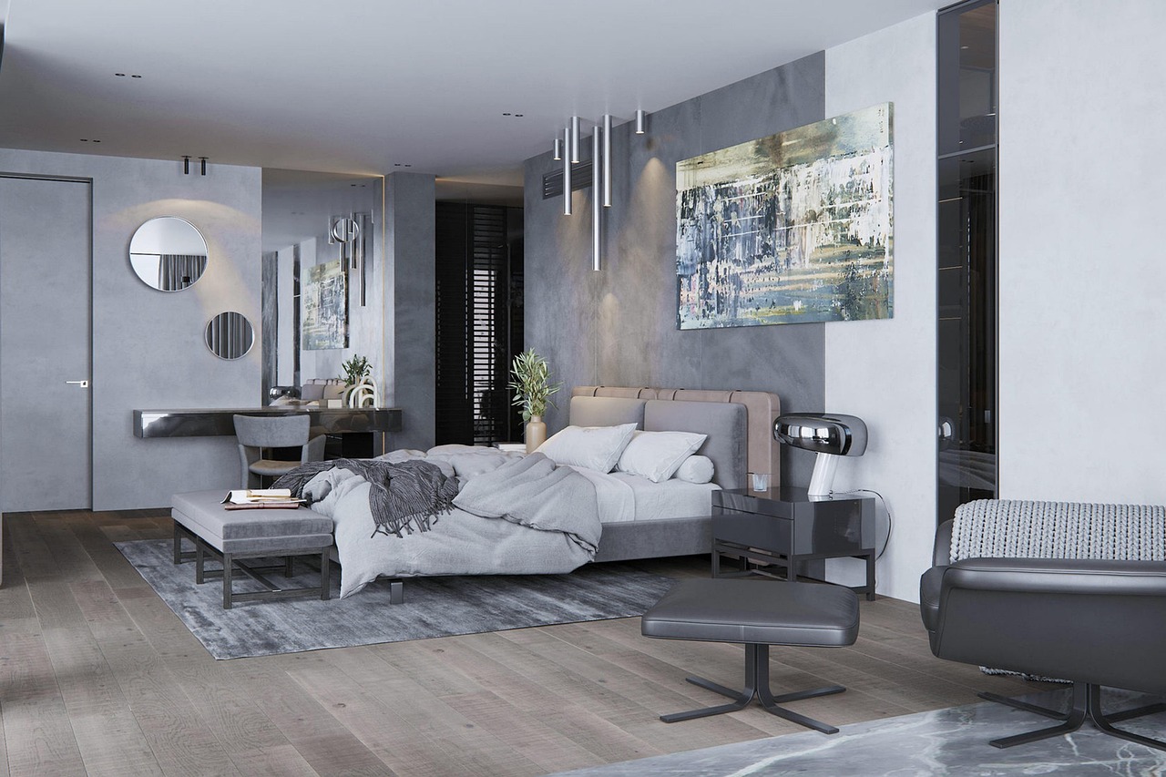 sleek, gray, white, and black master's suite with a contemporary design